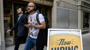 US jobs data boosts equities; dollar slides