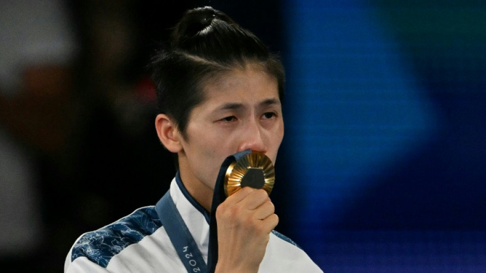 Gender-row boxer Lin targets Asian Games after bronze on comeback