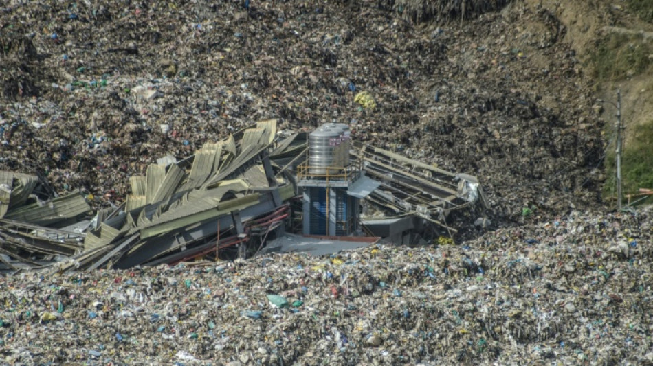 'Racing against time': Death toll rises after Philippines trash site collapse