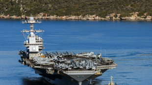Laundry fire on giant US aircraft carrier injures two: US military