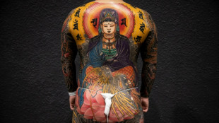 Des maîtres du tatouage exhibent leur savoir-faire dans une foire à Hong Kong