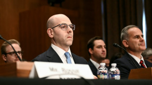 Trump's Fed pick plans to keep White House job while at central bank