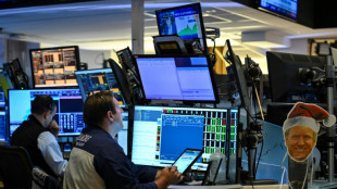 Wall Street sans grand élan, s'interroge sur les taux de la Fed