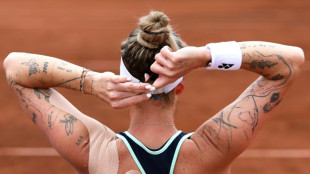 Vondrousova plays through pain to meet Pegula at French Open