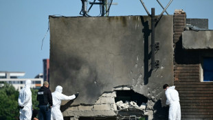 Russia accused over drone that hit Romanian apartment block, Putin hits back