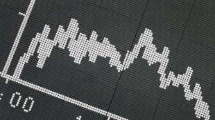 Asian markets fall, yen rallies after BoJ policy move